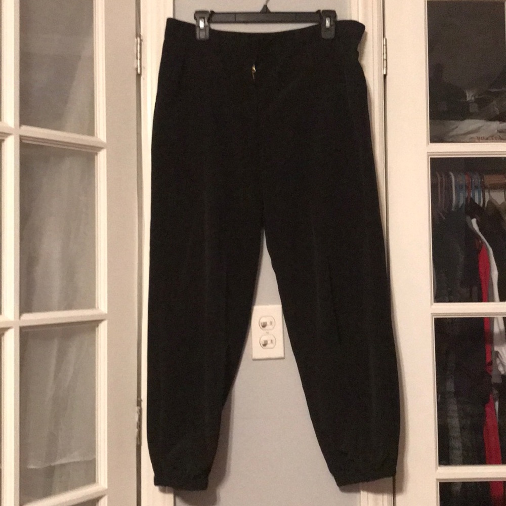Lovely black, silky track pants / joggers.